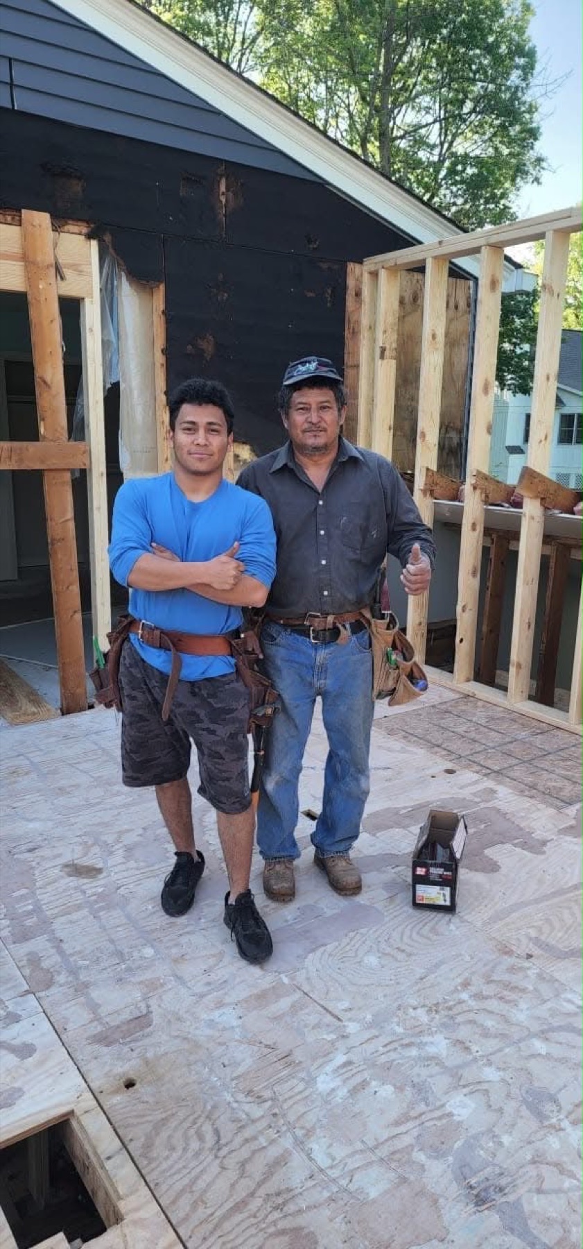 The Five Star Renovations team on a new-construction jobsite